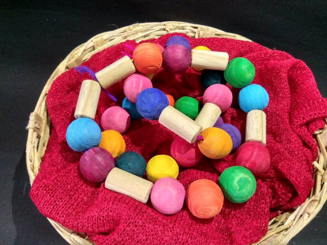 threading beads montessori